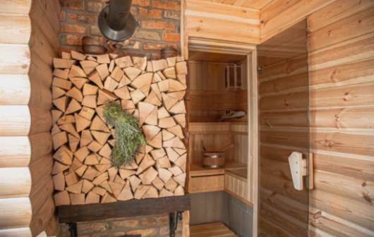 Wateremmers en pollepels: Traditionele sauna accessoires